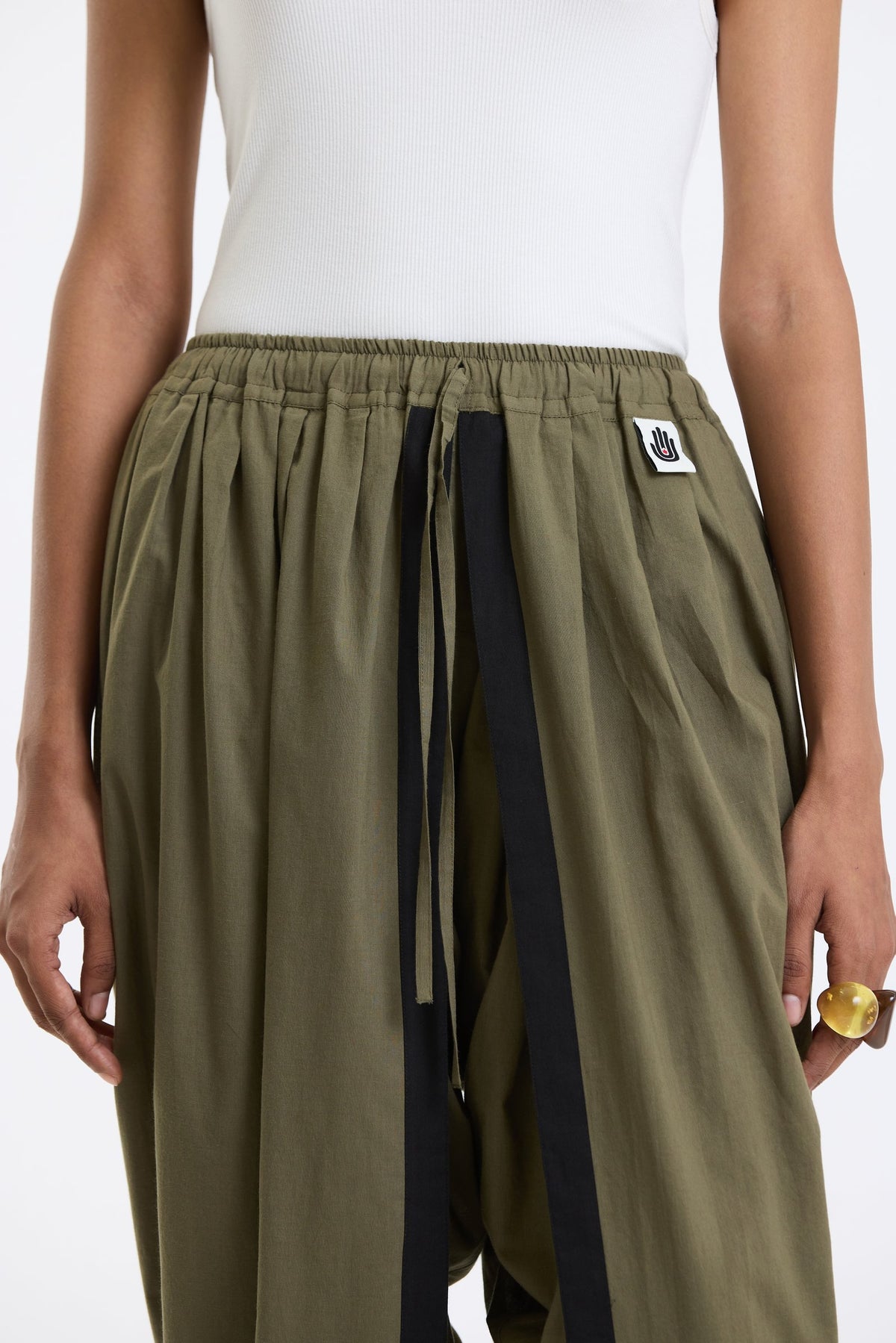 Cotton Dhoti Pants – Olive Green by Swasthii, worn by a model – view 3