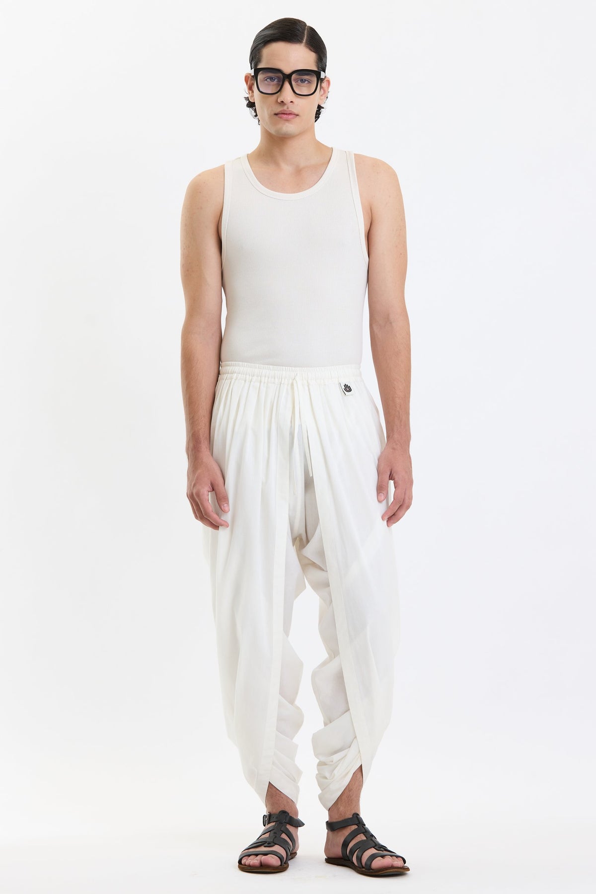 Cotton Dhoti Pants – White by Swasthii, worn by a model – view 1