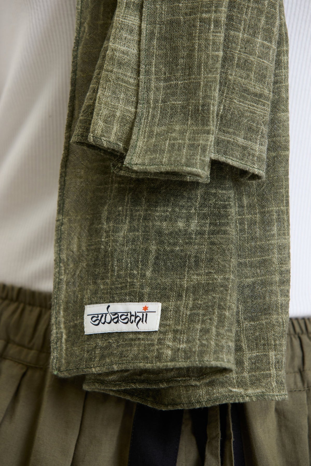 Cotton Stole – Olive Green by Swasthii, worn by a model – view 4