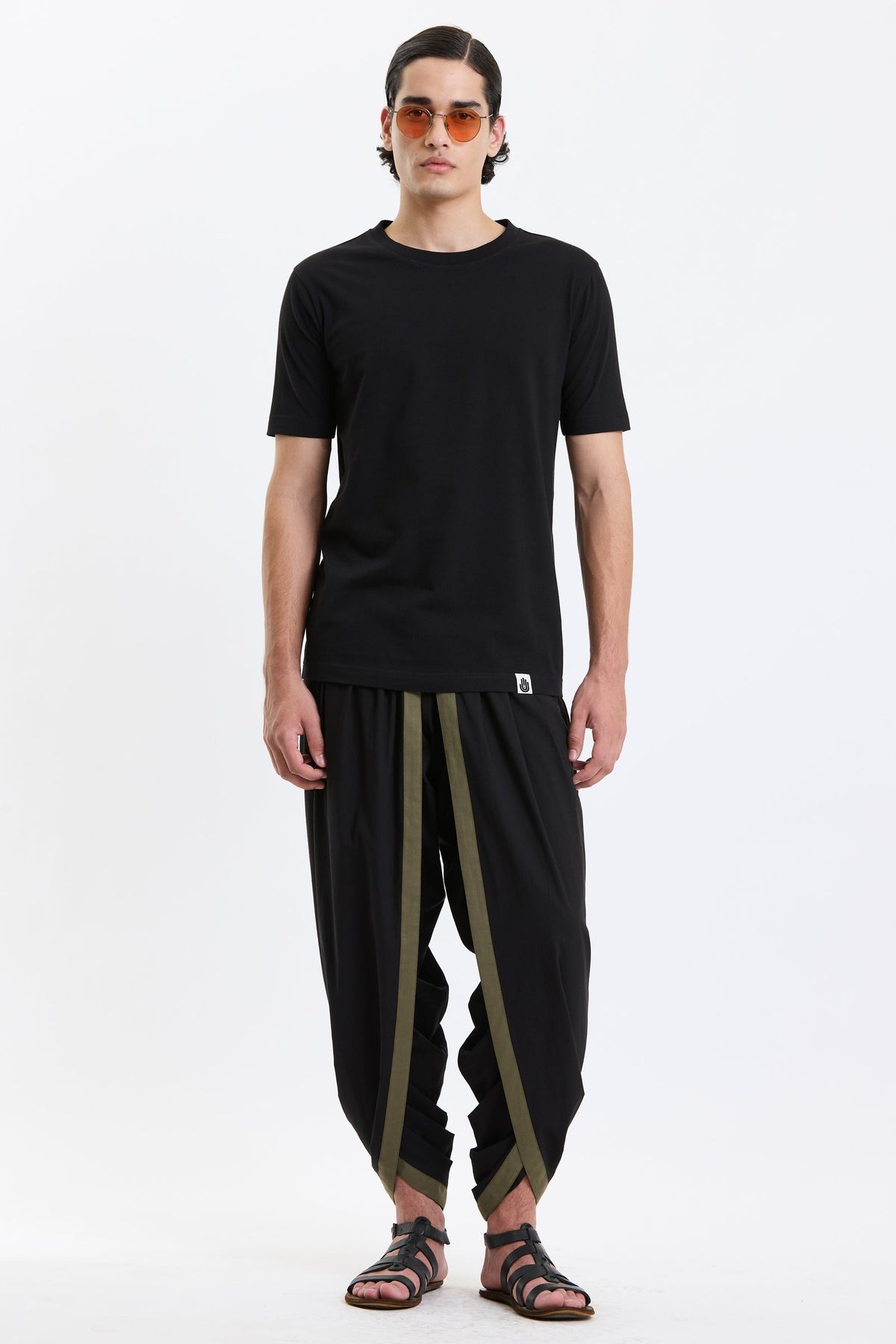 Cotton T-Shirt – Black by Swasthii, worn by a model – view 1