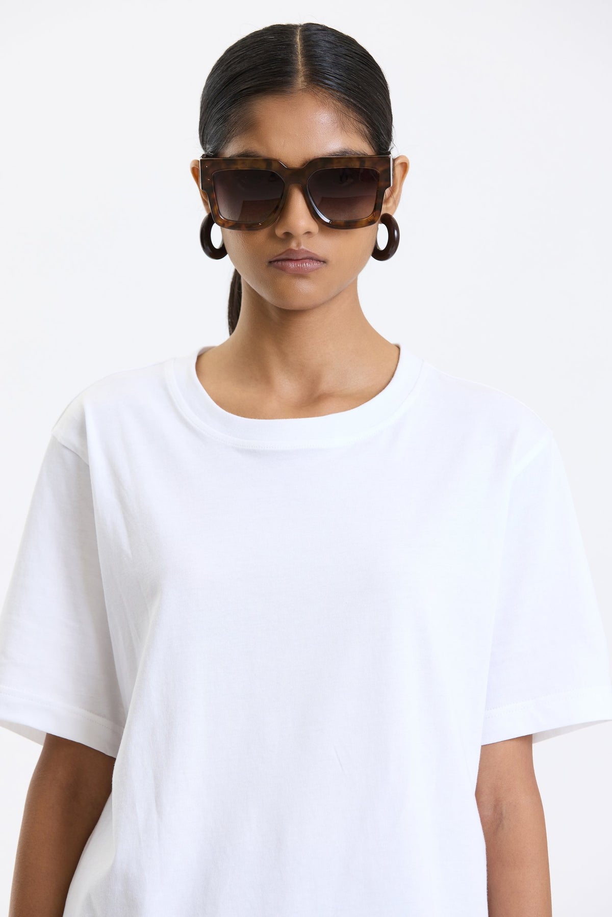Cotton T-Shirt – White by Swasthii, worn by a model – view 3