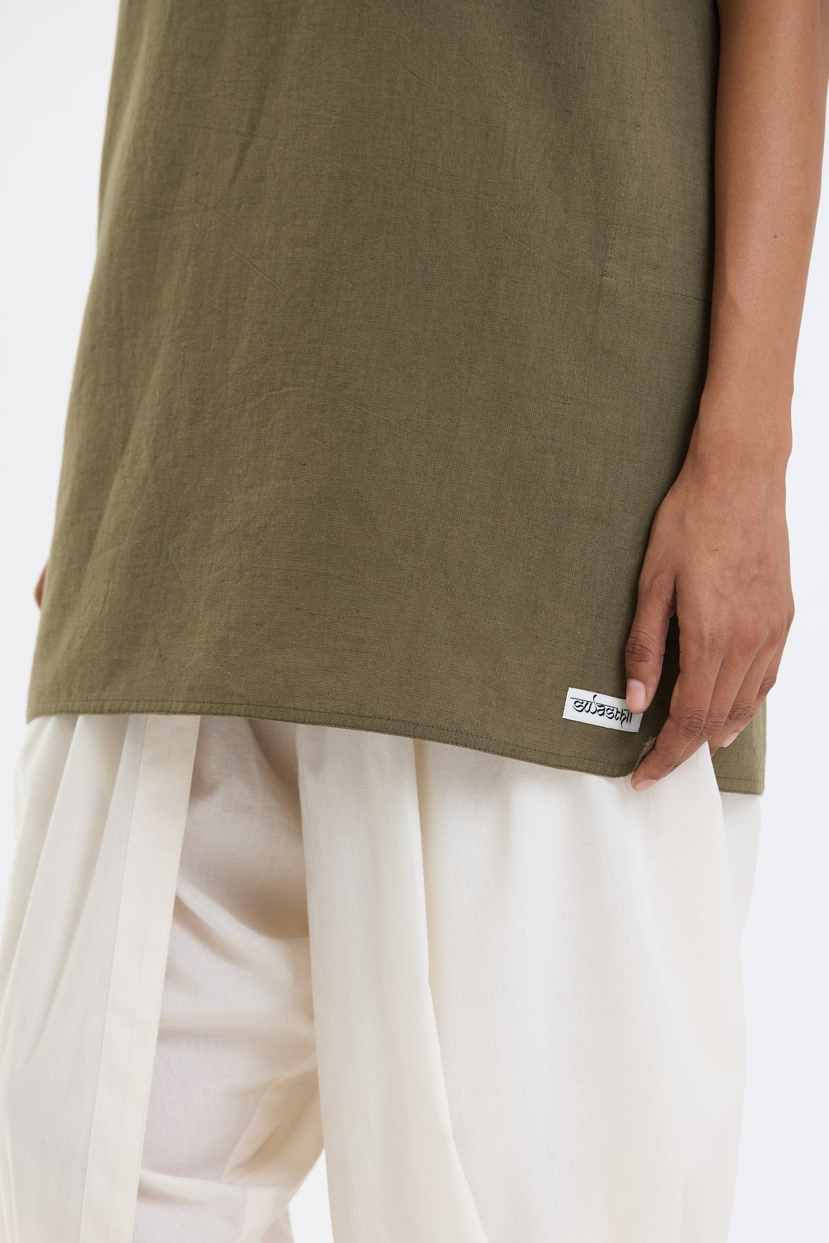 Mandarin Collar Vest – Olive Green by Swasthii, worn by a model – view 3
