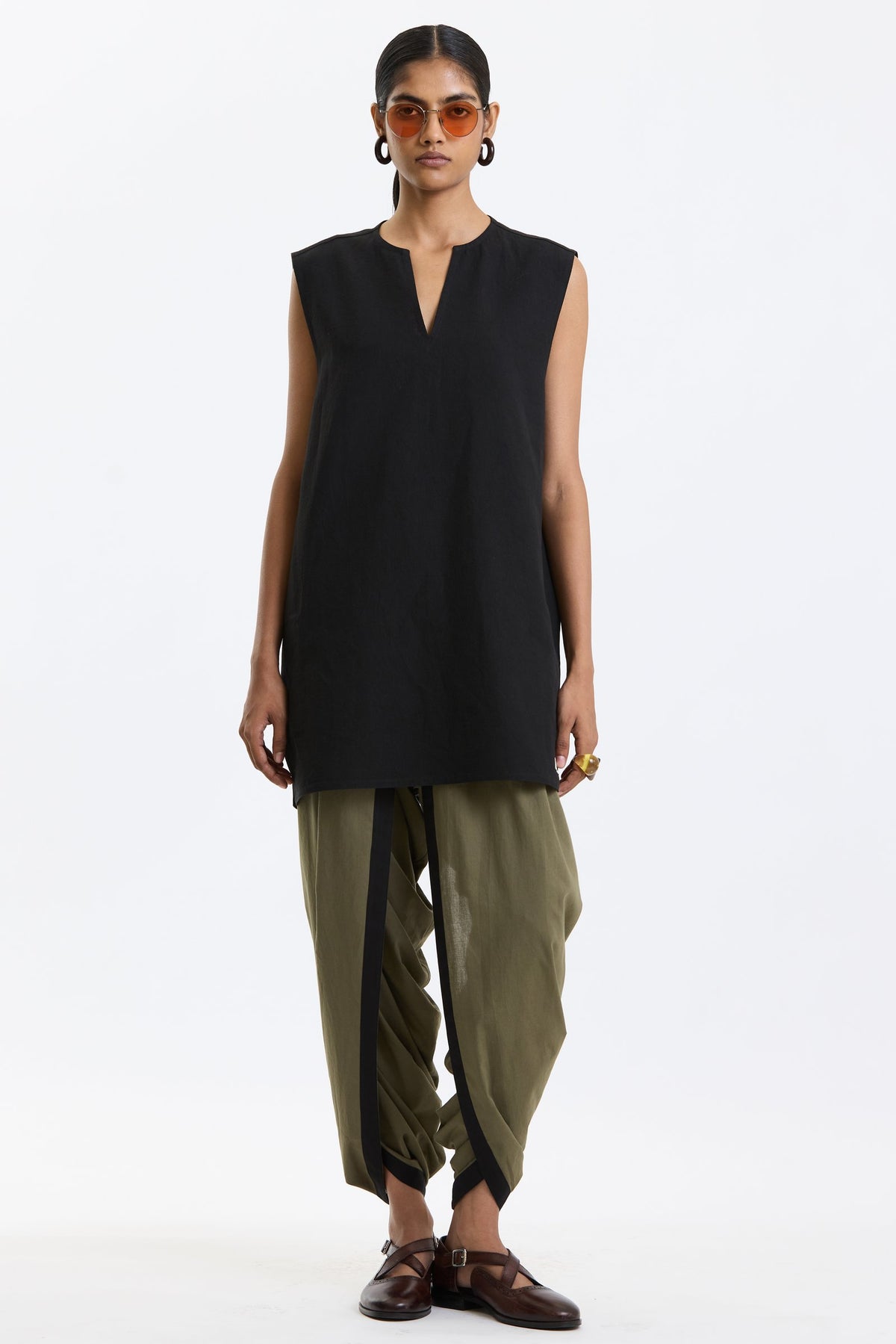 V Neck Vest – Black by Swasthii, worn by a model – view 1