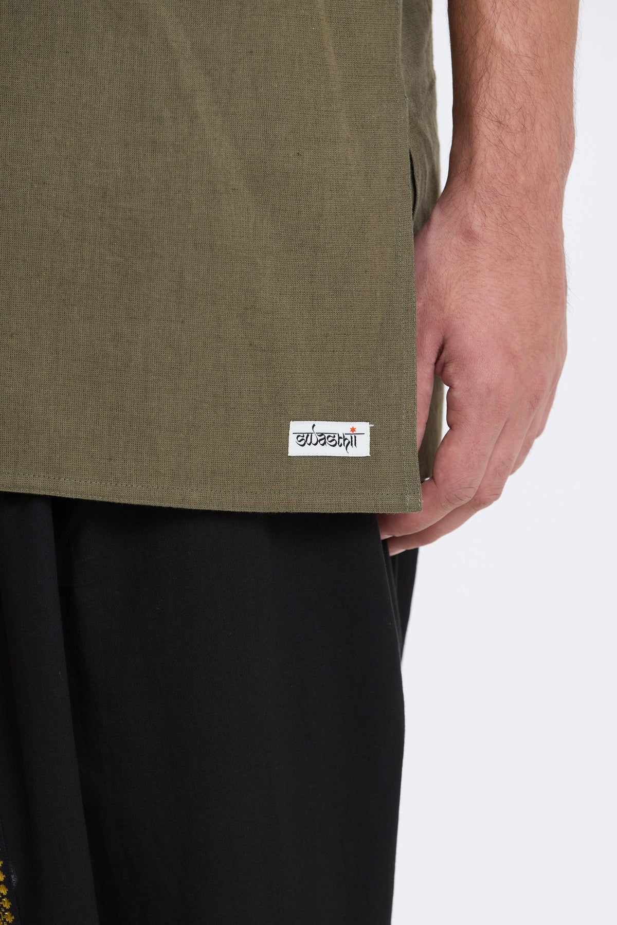 V Neck Vest – Olive Green by Swasthii, worn by a model – view 3