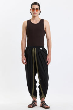 Cotton Dhoti Pants – Black & Olive by Swasthii, worn by a model – view 1