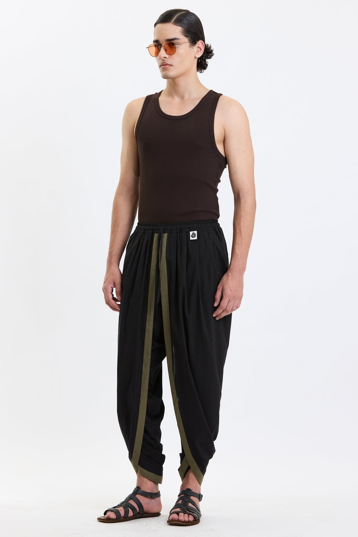 Cotton Dhoti Pants – Black & Olive by Swasthii, worn by a model – view 3