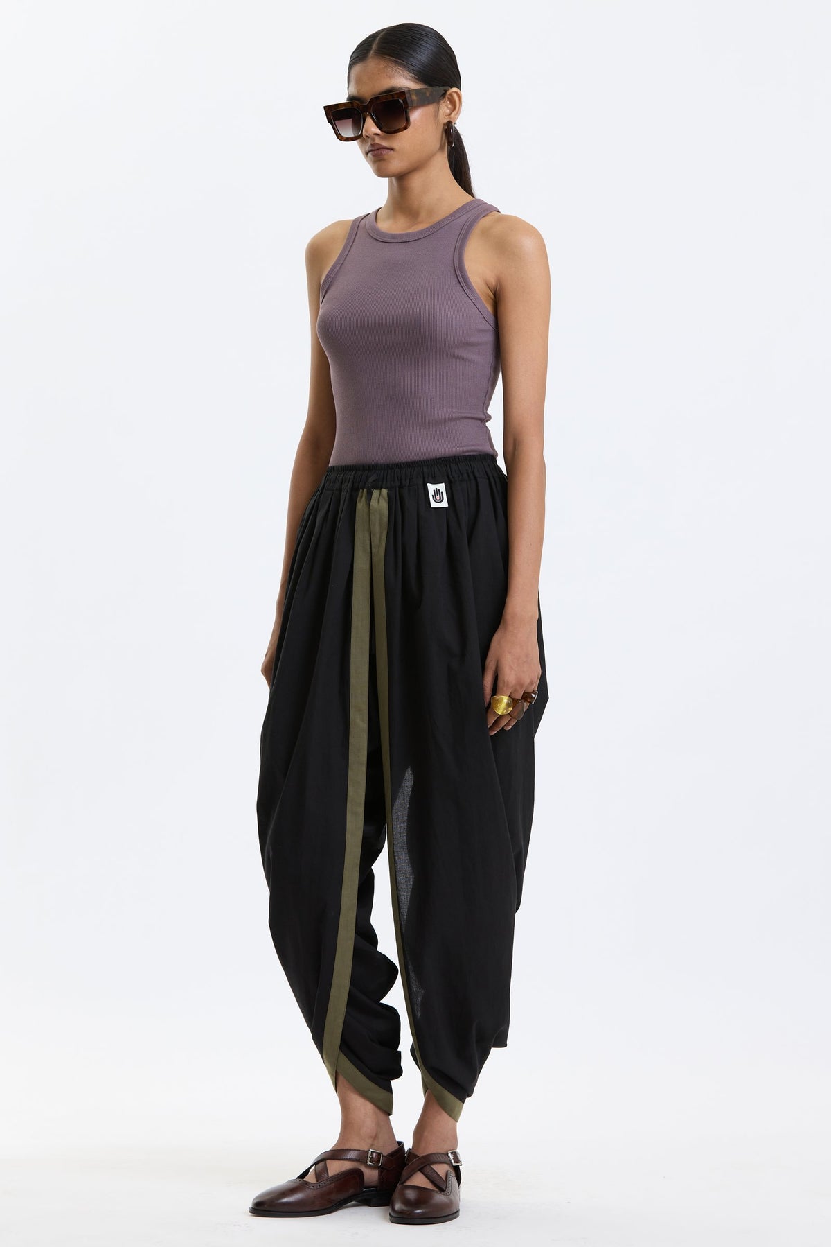 Cotton Dhoti Pants – Black & Olive by Swasthii, worn by a model – view 3