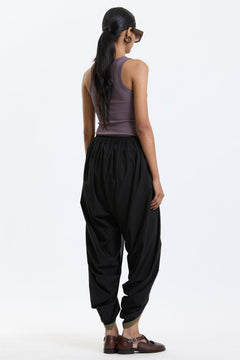 Cotton Dhoti Pants – Black & Olive by Swasthii, worn by a model – view 4