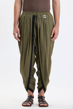 Cotton Dhoti Pants – Olive Green by Swasthii, worn by a model – view 3