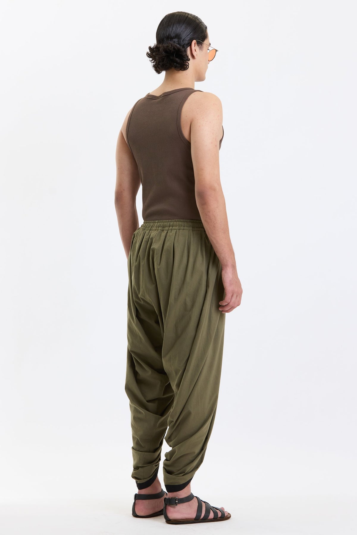 Cotton Dhoti Pants – Olive Green by Swasthii, worn by a model – view 4