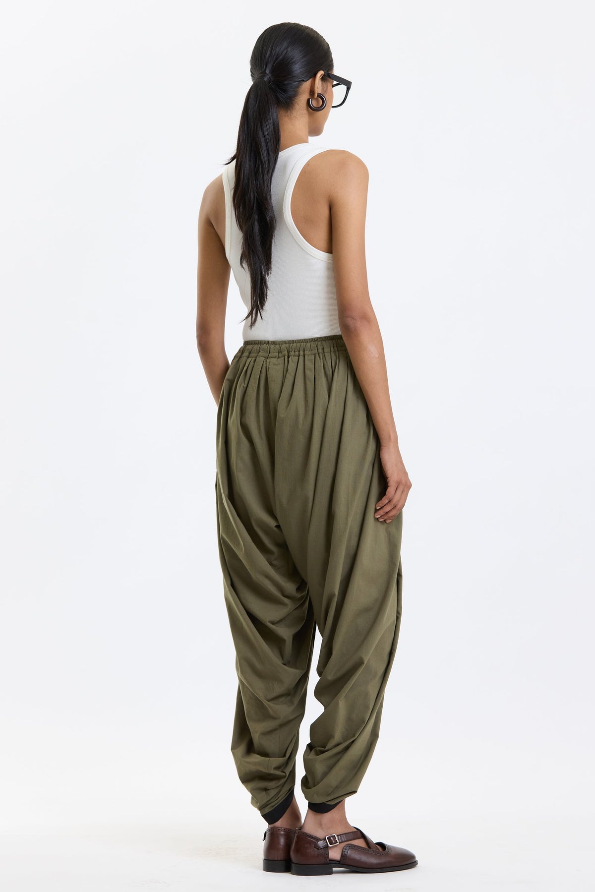 Cotton Dhoti Pants – Olive Green by Swasthii, worn by a female model – view 4