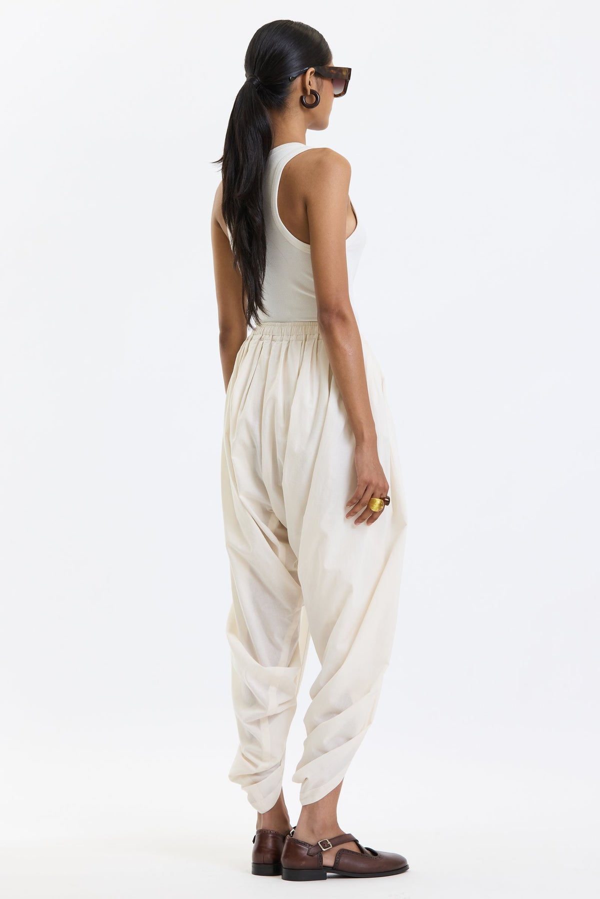 Cotton Dhoti Pants – White by Swasthii, worn by a model – view 1