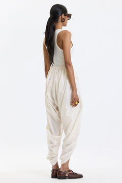 Cotton Dhoti Pants – White by Swasthii, worn by a model – view 1