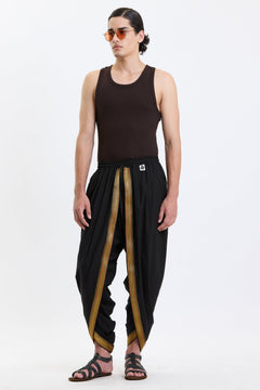 Cotton Dhoti Pants with Zari Border – Black & Gold by Swasthii, worn by a model – view 2
