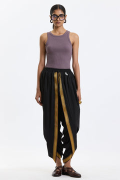 Cotton Dhoti Pants with Zari Border – Black & Gold by Swasthii, worn by a model – view 1