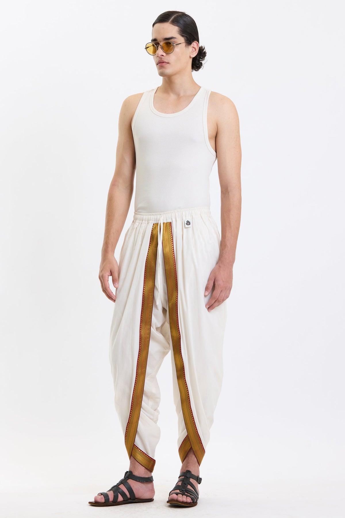Cotton Dhoti Pants with Zari Border – White & Gold by Swasthii, worn by a model – view 3
