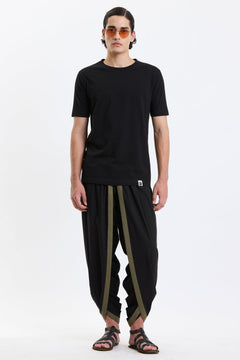 Cotton T-Shirt – Black by Swasthii, worn by a model – view 1