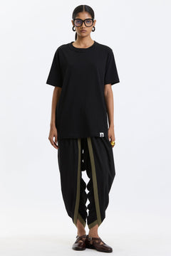 Cotton T-Shirt – Black by Swasthii, worn by a model – view 1