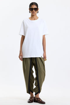 Cotton T-Shirt – White by Swasthii, worn by a model – view 1