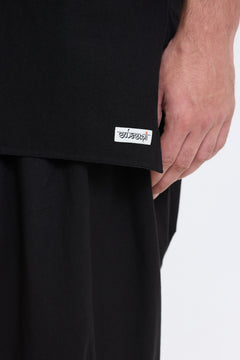 Mandarin Collar Vest – Black by Swasthii, worn by a model – view 3