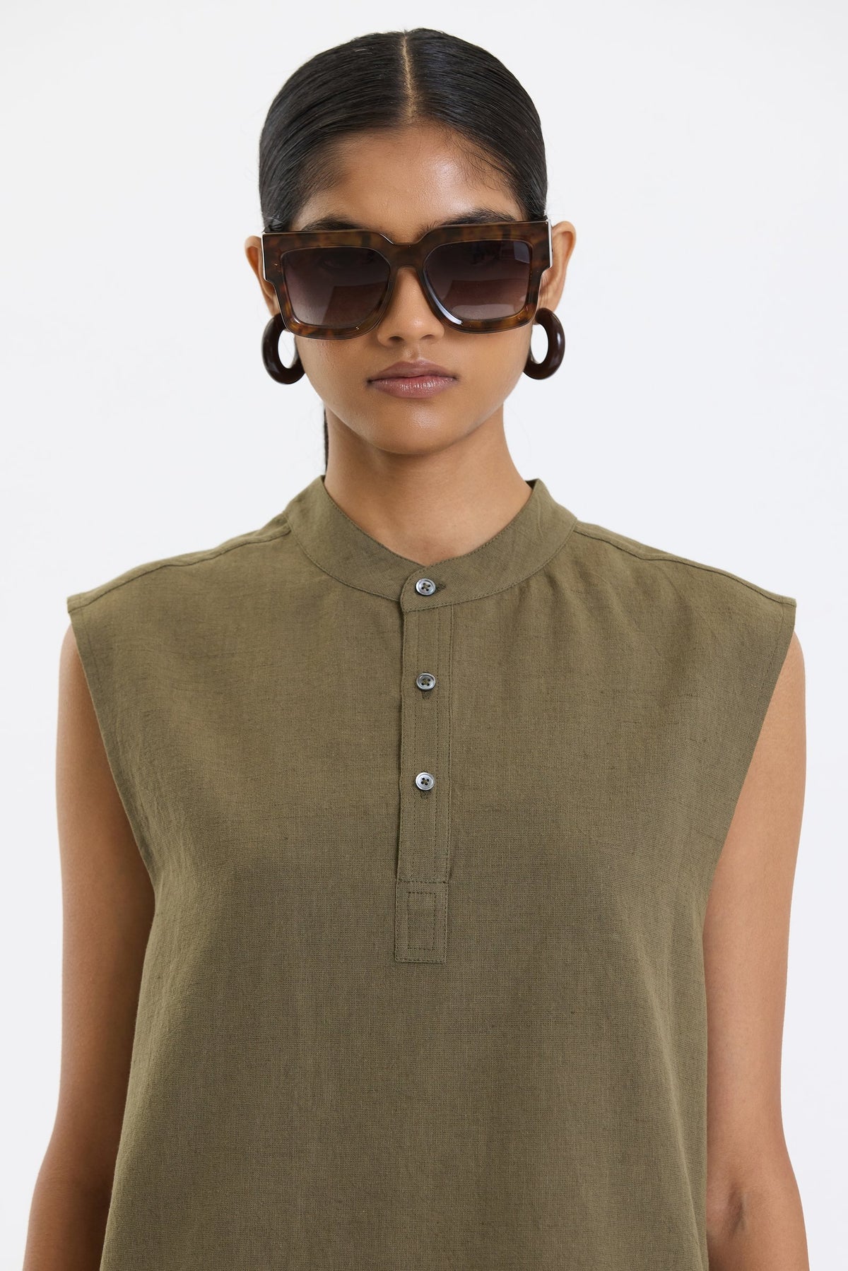 Mandarin Collar Vest – Olive Green by Swasthii, worn by a model – view 4