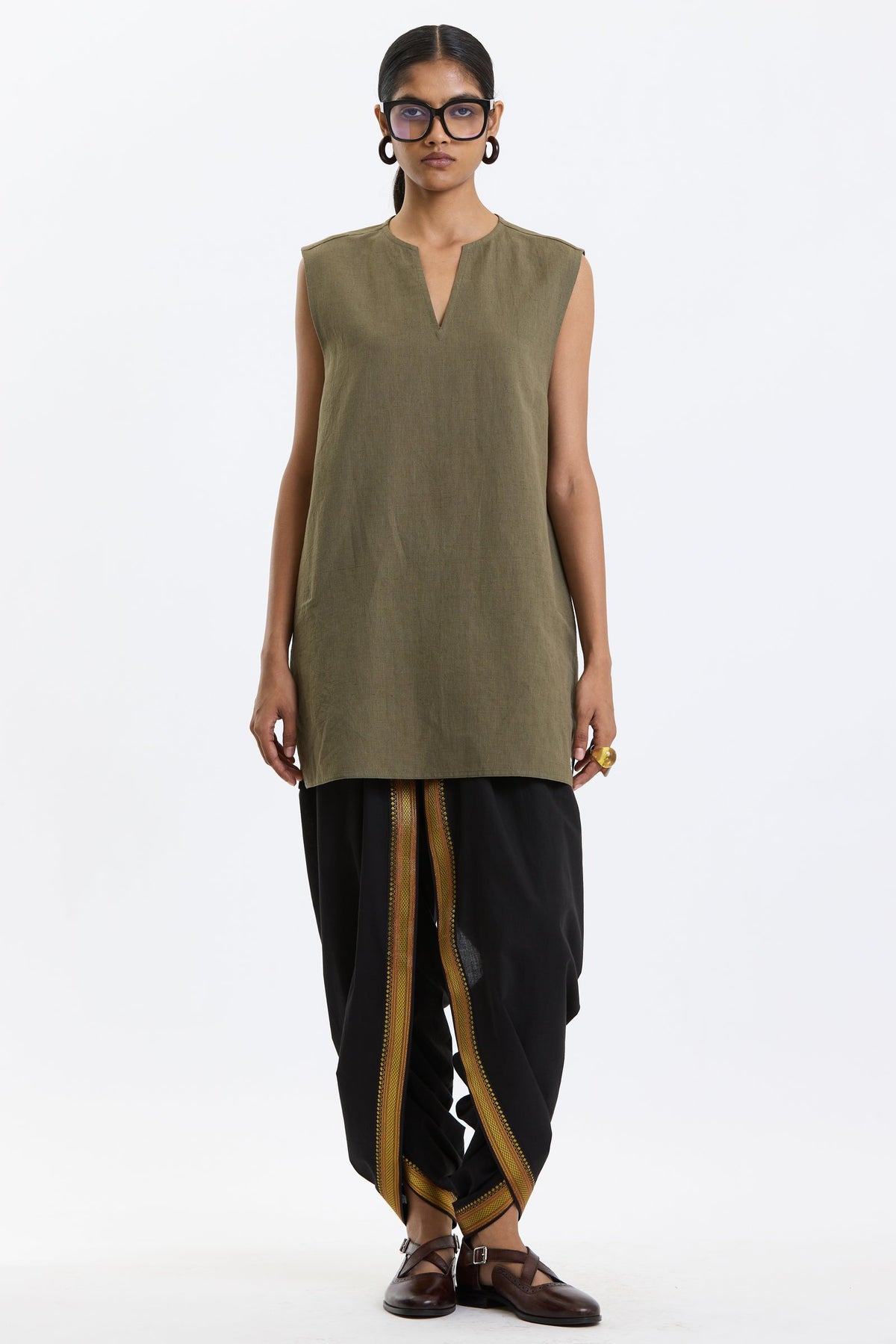 V Neck Vest – Olive Green by Swasthii, worn by a model – view 1