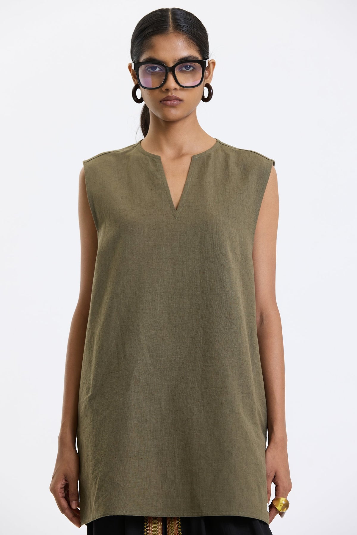 V Neck Vest – Olive Green by Swasthii, worn by a model – view 2